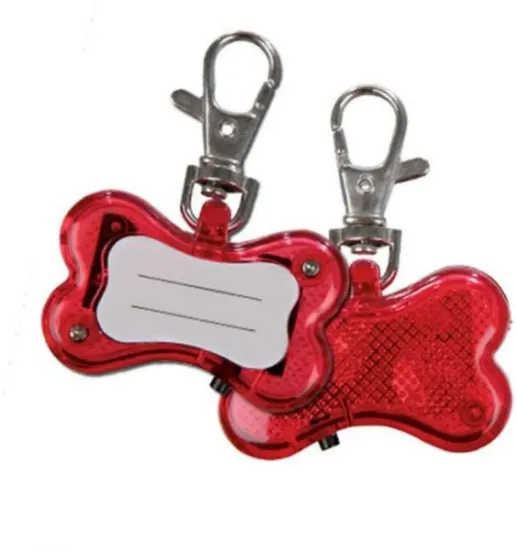 Снимка на Trixie Flasher For Dogs - Кучешки фенер под формата на кокалче 4.5 / 3 см.